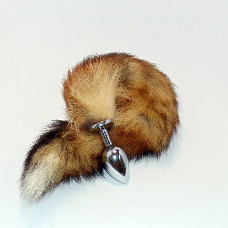 пробка металлическая с хвостом "королевская лиса" рыжая 47077-1-mm в России