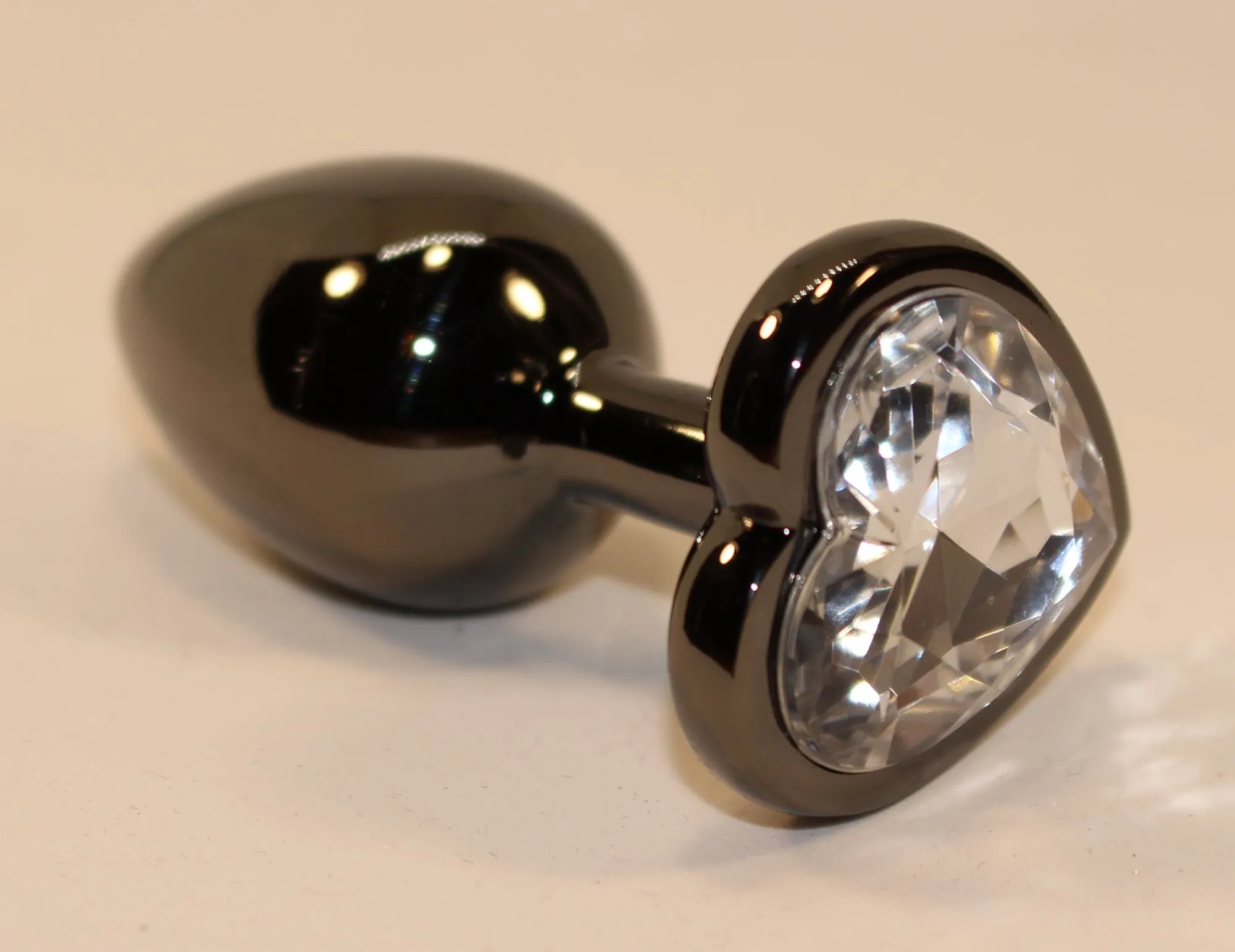 пробка анальная черная 8х3,5см с сердечком прозрачный страз 47447-4mm в России